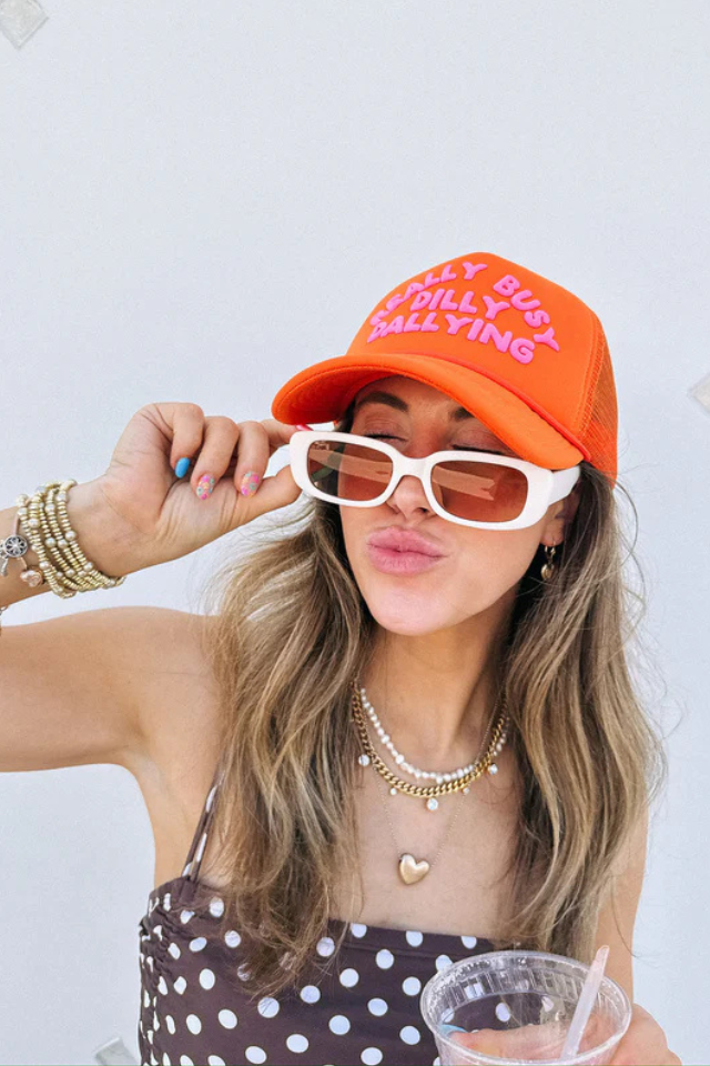 Dilly Dallying Orange Trucker Cap