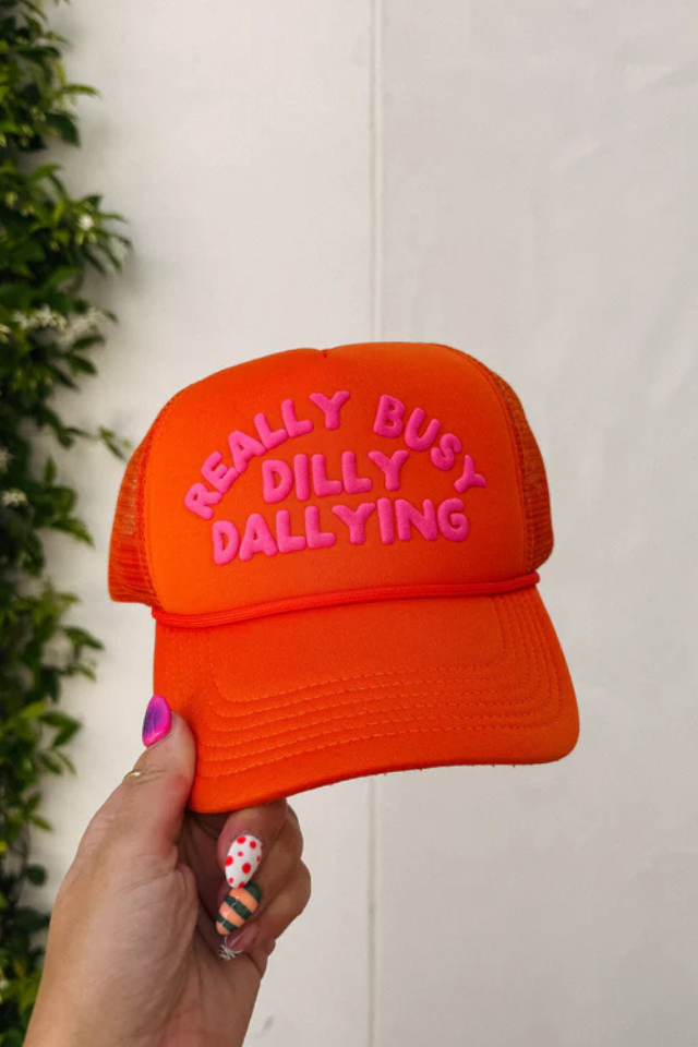 Dilly Dallying Orange Trucker Cap