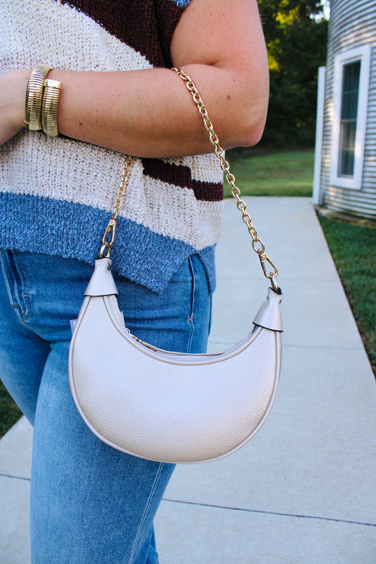 Zora Champagne Half-Moon Shoulder Bag